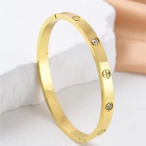 Gold Bangle Bracelet with zircon. Love inspired. 18kt gold plated. Bangle buckle